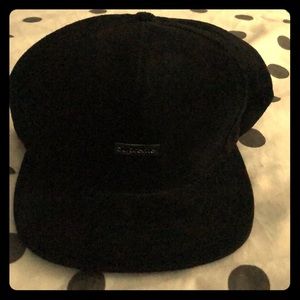 Black suede Supreme hat